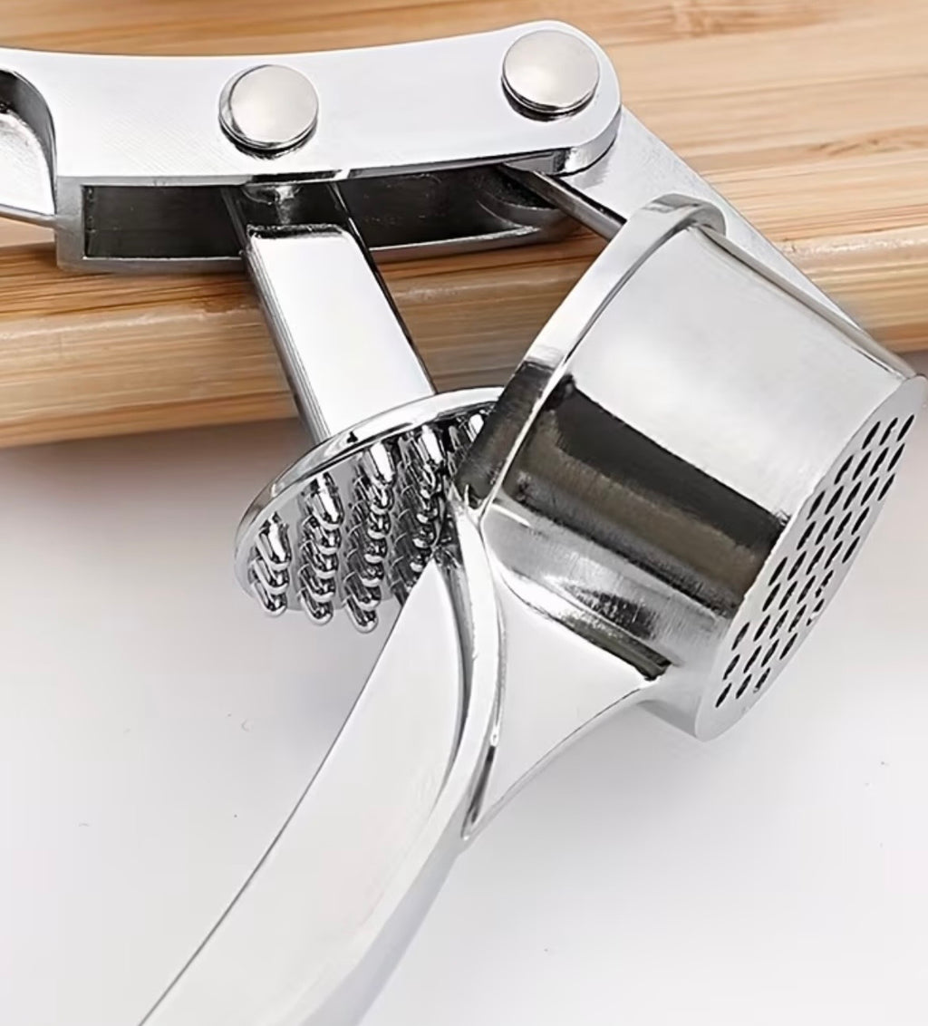 1 piece of garlic press